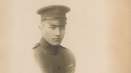 Portrait of Fred Thomas in military uniform.