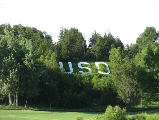 USD hillside concrete letters.